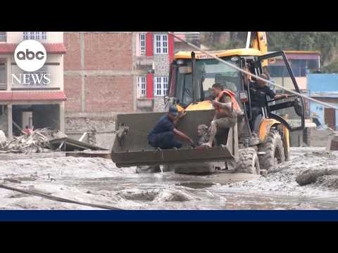 Death toll rises as rescuers search for victims of Nepal flood