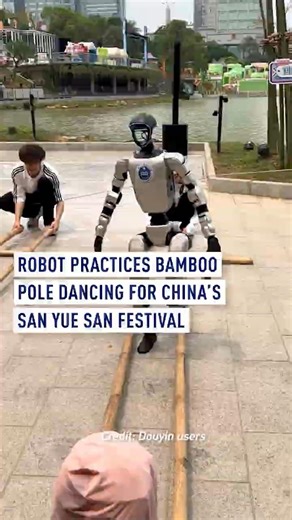 Robot practices bamboo pole dancing for China's San Yue San Festival