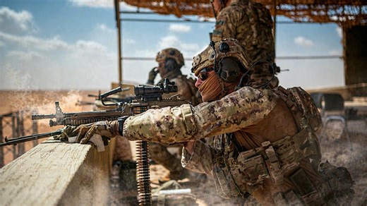 Italian rangers practice combat drills in live fire exercise