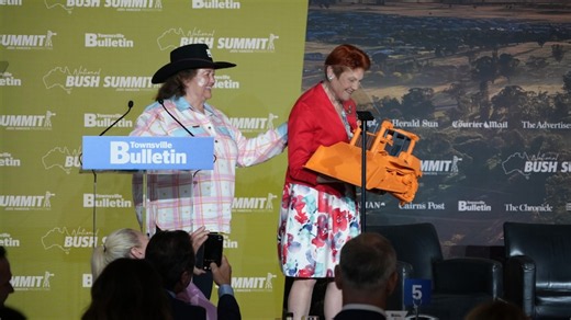 A growling Gina Rinehart gifts Pauline Hanson a 'beautiful' orange bulldozer