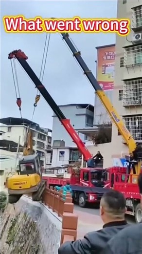 Terrible Failure: Boom Snaps While Two Cranes Hoist Excavator On Slope#ConstructionFailure#HeavyLift