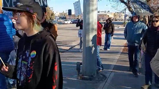 For a second week in a row, a small group of locals gathered on the Broadway Bridge in Idaho Falls to protest American military aggression. We counted about 100 protesters overall. | East Idaho News