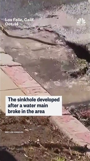 Giant sinkhole partially swallows Spectrum van