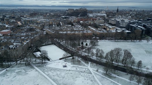 Drone footage shows Edinburgh blanketed in snow after wintry overnight conditions