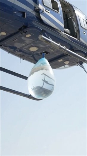 Helicopter Lifts a Giant Water Drop