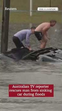 TV reporter and bystander rescue driver moments before car sinks in Australian floodwaters