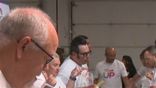 Comcast employees volunteer to pack school supplies