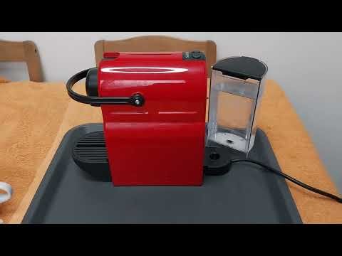 Old Nespresso coffee machines have run out of water; tips on how to refill them.