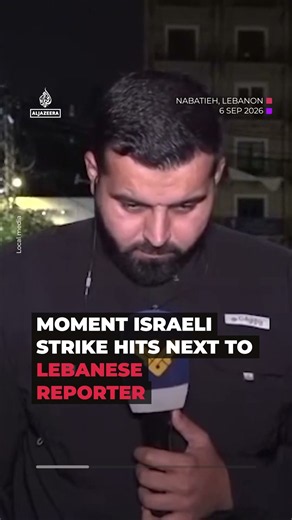 Moment Israeli strike hits next to Lebanese reporter