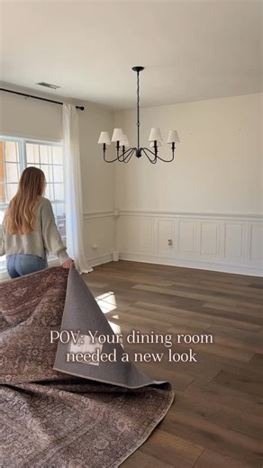 POV: Your dining room needed a new look! Comment HOME and I’ll send you links to everything I used! I’ve been wanting to give this room a little mini makeover for a while now but I have such a hard time making decor decisions so it took me forever to actually do it. 🤣 I changed the rug to a warm and moody rug. This is a high traffic area for us so I need a durable rug that would hide dirt and stains! I also changed our end chairs to a darker color. We had white ones and I really liked them but 