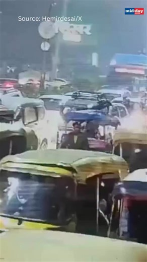New CCTV footage shows the exact moment of the car explosion near Delhi’s Red Fort that killed eight people and injured several others. The visuals capture a bright flash and flames engulfing the area within seconds of the blast, offering investigators a closer look at the intensity of the explosion. Source: Hemirdesai/X | MiD DAY