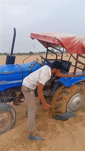 Traktor befreien: Wie ein alter Reifen und ein Seil einen im Sand steckenden Schlepper retten