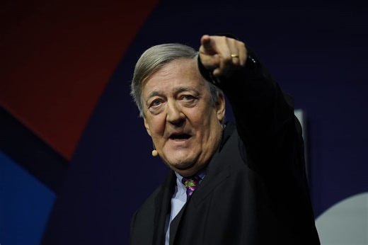 Stephen Fry sues companies after breaking leg and ribs fall at O2