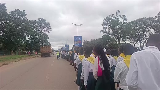 YOU ARE JOINING US LIVE FROM WUZAKILE SECONDARY SCHOOL, WHERE WE ARE HONORING THE LIFE AND MEMORY OF THE LATE MG JONATHAN CHANDA OF WUZAKILE MAIN SDA CHURCH, UNDER THE COPPERBELT ZAMBIA CONFERENCE. BR. JONATHAN HAS BEEN DESCRIBED AS A VETERAN MASTER GUIDE WHO MENTORED MANY YOUTHS IN THE CHURCH, AND HIS LEADERSHIP WAS AN EXAMPLE TO OTHERS. WE SEND OUR SINCERE CONDOLENCES TO BROTHER JONATHAN'S FAMILY, FRIENDS, AND THE ENTIRE CHURCH COMMUNITY. MAY GOD OFFER THEM COMFORT AND PEACE DURING THIS DIFFIC