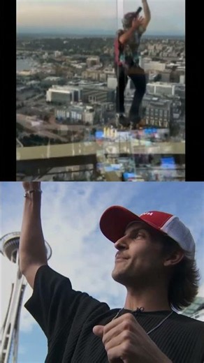 Video shows two men backflip off the top of the Space Needle