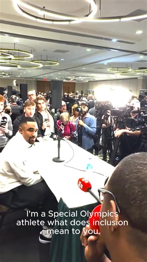 🏈 NFL playoffs are kicking off! As the road leading to Super Bowl LX begins, remember an unforgettable moment from the Super Bowl LIX Media Row! Special Olympics’ own Malcom Harris-Gowdie stepped into the spotlight as a field reporter for FanSided, bringing the power of inclusion to the big stage. He asked Philadelphia Eagles QB & Super Bowl MVP, Jalen Hurts, what inclusion means to him, a powerful reminder that sports unite us all. #ChooseToInclude #SuperBowlLX | Special Olympics