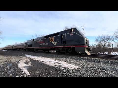 AMTK 100 leads the Empire Service 281 past Centerport, westward toward Niagara Falls. Feb. 28, 2026.