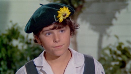 Peter signs up with the Sunflower Girls, while Marcia decides to audition for the Frontier Scouts. | The Brady Bunch