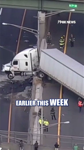 WATCH: Truck hangs over median after crash