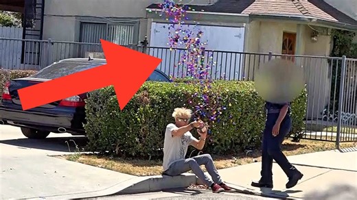 Female cop pranked by a magician with confetti magic