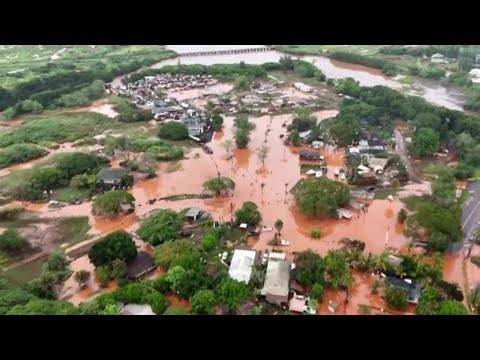 Major flood emergency prompts mass evacuations and rescues in Hawaii