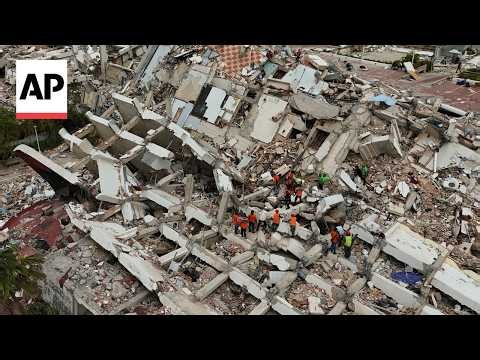 Drone video shows Venezuelans retrieving bodies from rubble 10 days after earthquakes