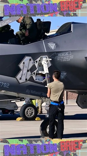 U.S. Marine Crew opens and closes the ladder on an F-35 Lightning II