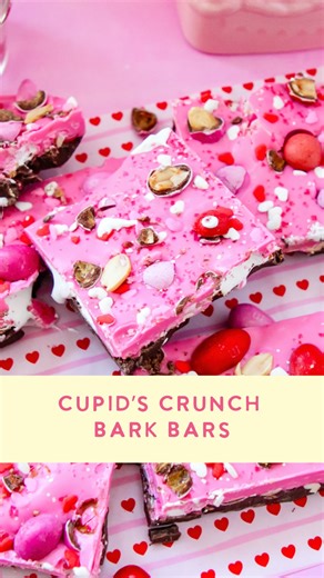 Taryn Camp on Instagram: "Cupid’s Crunch Bark Bars- layered chocolate filled with fluff, M&M peanuts, and waffle cone pieces with a Valentines touch. I layered all of this in an 8” pan lined with parchment and used Ghirardelli melts. For all the details and links comment RECIPE and I’ll DM it :) #chocolate #chocolatebark #mmschocolate #mms"
