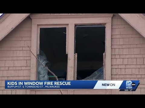 Two children hanging from attic window rescued in Milwaukee house fire