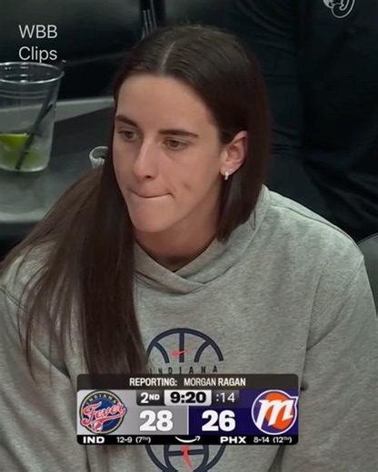 Caitlin Clark on the sideline with injury