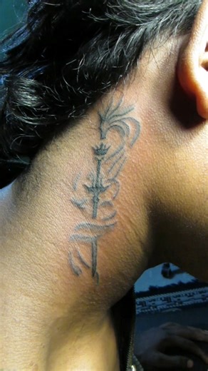 Neck piercing sword with dragon tattoo.🐉