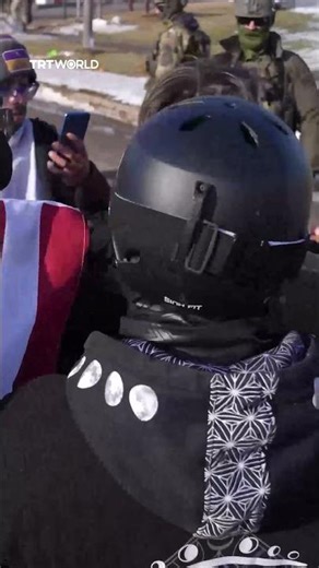 Anti-ICE and counter-protesters clash outside federal building in Minneapolis