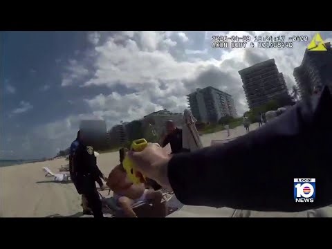 Exclusive: Video shows man accused of armed threats on beach