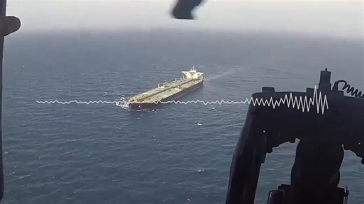 Audio of a Sailor aboard USS Michael Murphy (DDG 112), with video from the guided-missile destroyer’s embarked helicopter flying over the Gulf of Oman, as the U.S. Navy diverts a merchant vessel while enforcing the blockade on ships entering or departing Iranian ports. (U.S. Central Command Public Affairs video)