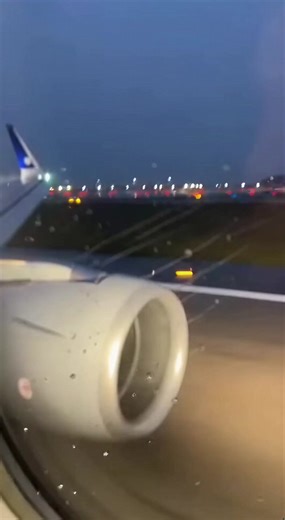 Raw Smartphone Footage Of A Terrifying Boeing Jet Rejected Takeoff And Runway Excursion ------------ ----------- ------------- This intense found-footage video captures the harrowing moments of a commercial boeing jet attempting a high-speed takeoff in heavy rain. Filmed from a vertical smartphone perspective in a window seat, the scene begins with blurred runway lights and rain-streaked glass. Suddenly, the aircraft suffers a violent yaw, throwing the camera sideways as the engines throb with a