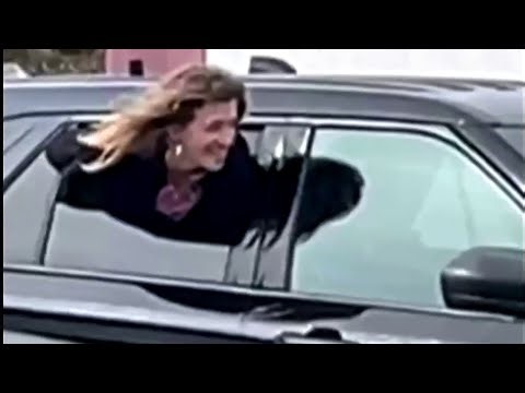 Michigan woman goes viral over Houdini-like escape from police cruiser