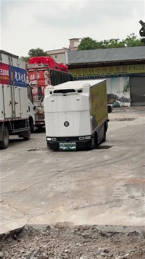 Autonomous delivery robot gets stuck in warehouse pit in Guangdong, China