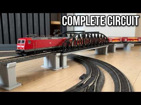 watch red trains complete the circuit on this detailed layout