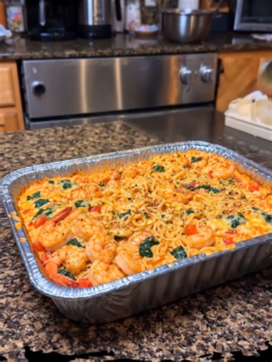 Creamy Cajun Shrimp Pasta Bake Ingredients: 8 ounces penne pasta 1 pound shrimp peeled and deveined 1 cup heavy cream 1 cup Cajun seasoning 1 cup diced tomatoes 1 cup shredded cheese 2 tablespoons olive oil 1 tablespoon minced garlic Directions: Preheat the oven to 350 degrees Fahrenheit Cook the penne pasta according to the package directions until tender then drain it thoroughly Heat the olive oil in a large skillet over medium heat Add the minced garlic and sauté until fragrant Add the shrimp