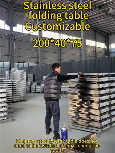 200*40*75, Stainless Steel Multi-Purpose Workbench One table, multiple uses. The 2-meter extended countertop meets diverse needs: workshop assembly, garment cutting, hardware fabrication, outdoor vending, or banquet catering. The stainless steel surface repels water and grease—wipe clean effortlessly. Resists rust in humid environments with zero maintenance costs. 【Foldable & Portable, Flexible Adaptability】75cm ergonomic height ensures comfortable standing work. Legs feature reinforced steel tu