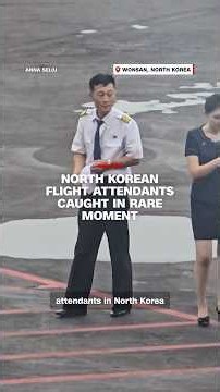 North Korean flight attendants caught in rare moment