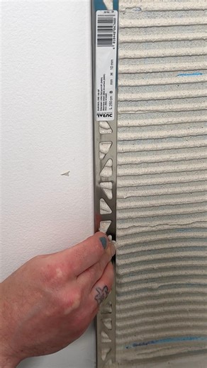 Tiling and trimming a bathroom splash back #tiling #diy #tiles #howto