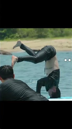 jimin doing handstand on paddleboard 🔥