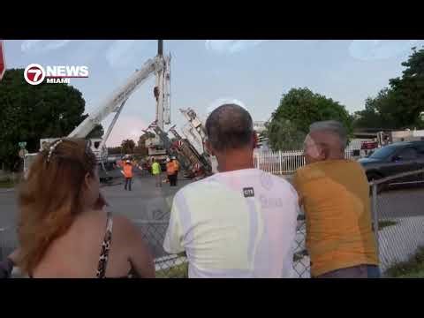 Crane falls over in front of 2 homes in Hialeah; no injuries reported