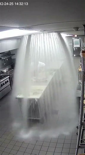 CCTV Footage: Ceiling Pipe Explosion Floods Kitchen 💦📹