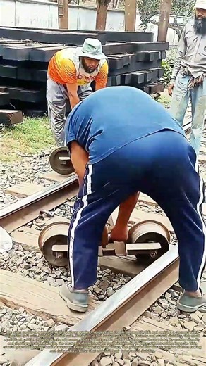 Placing Precision Gear: How Workers Set Rail Inspection Carts onto Track Lines