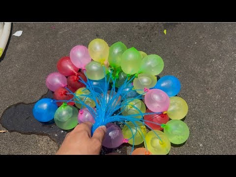 Experiment: Will 50 Balloons Explode If Filled with Water Simultaneously?