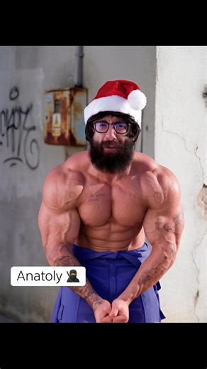 Anatoly's Holiday Gym Journey in Christmas Cap