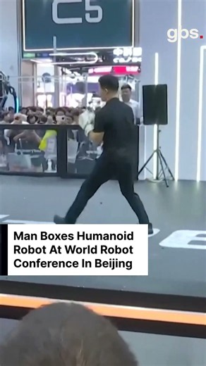 ROBOT VS HUMAN: Man Spars With Humanoid Robot At 2026 World Robot Conference In Beijing | AI1C