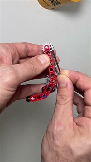 The SMALLEST working LEGO toy pistol in action